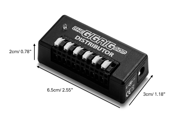 Angled image of GigRig Distributor with dimensions H:2cm W6.5cm D: 3cm
