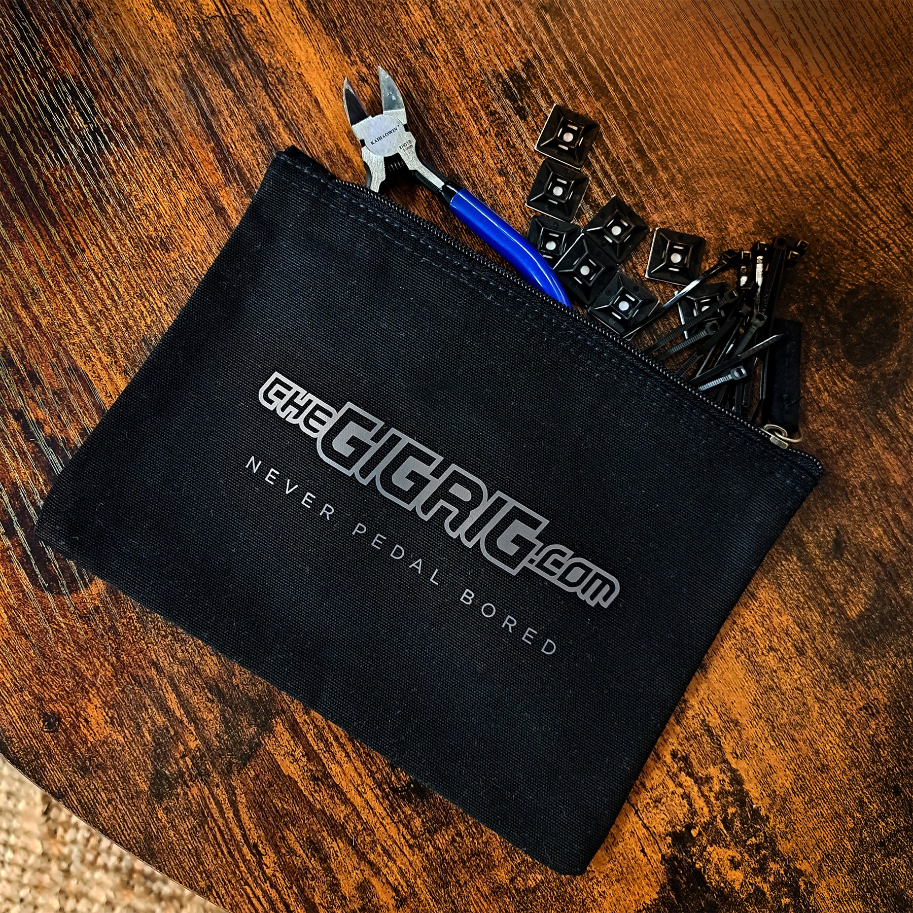GigRig Pouch with suggested use on wooden table.